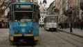 Blue trams and people on the Market Square in Lviv, Western Ukraine HD Footage