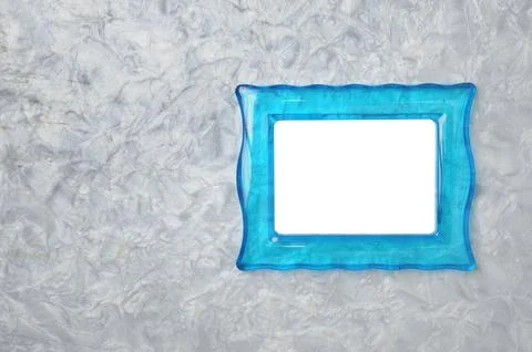 Blue translucent photo frame on marble background Stock Photos