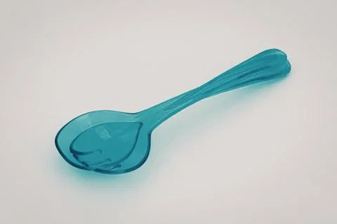 Blue transparent plastic spoon with handle Photos