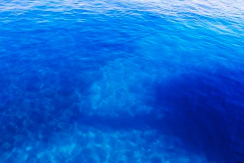 Blue transparent sea Stock Photos