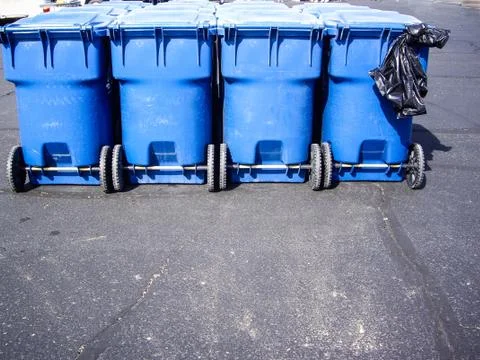 Blue trash containers Stock Photos