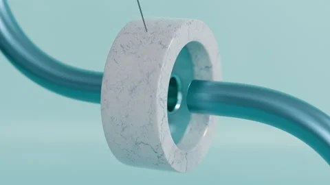 A blue tube and a ring on a string in a satisfying 3d animation Stock Footage 253595580