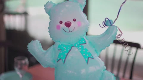 Blue, turquoise bear with helium Stock Footage 147683825