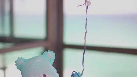 Blue, turquoise bear with helium Stock Footage 147684115