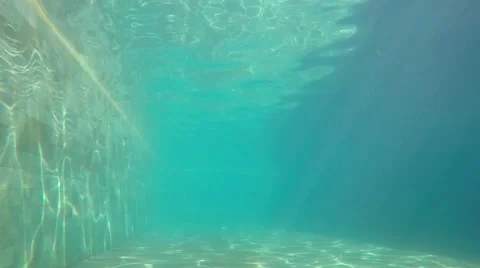 Blue Turquoise Water with Sun Rays in Swimming Pool Stock-Footage 66247407