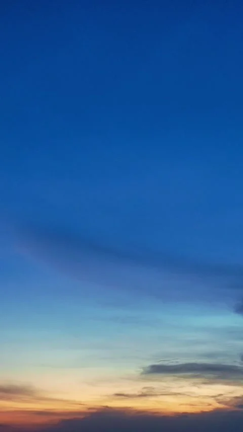 Blue twilight sky with warm sunset glow Stock Footage 335433141