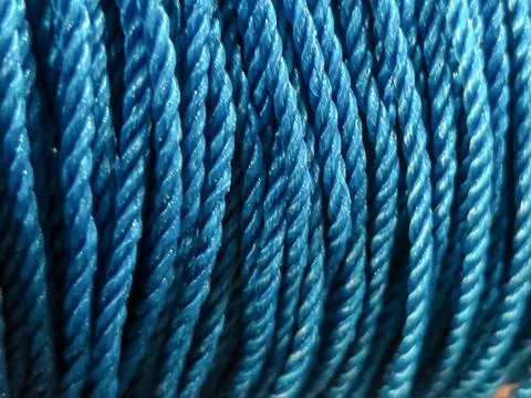 Blue twisted rope texture background, abstract industrial pattern Stock Photos