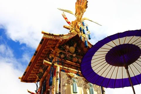 Blue umbrella &amp; float Stock Photos
