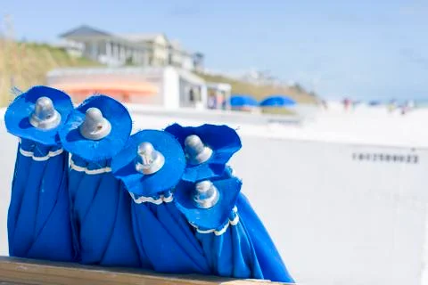 Blue Umbrellas at the Beach Stock Photos