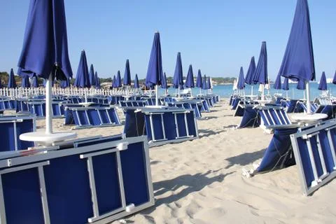 Blue umbrellas Stock Photos