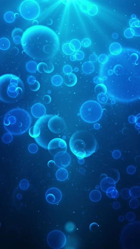 Blue underwater style bubble transparent spheres, soft light rays, floating part Stock Footage 340577925