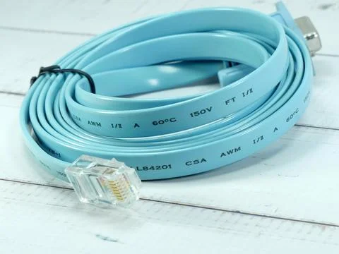 Blue USB cable on white background. Stock Photos
