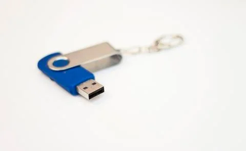 Blue usb flash drive for saving information on a white background close-up Stock Photos