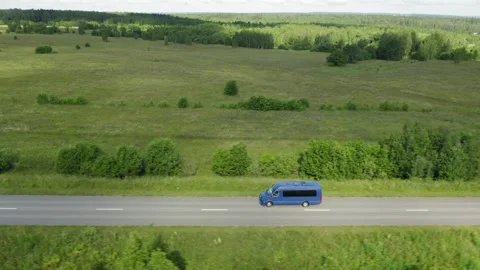 A blue van on asphalt road Video stock 165520747