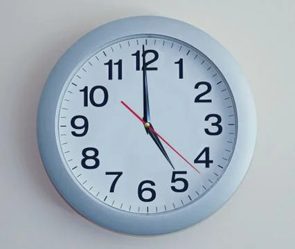 Blue wall clock Stock Photos