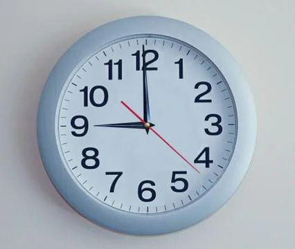 Blue wall clock Stock Photos