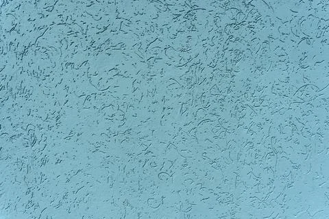 Blue wall with plaster background. Plaster and putty grain surface texture Foto stock