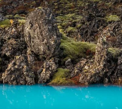 Blue water and lava field at the Blue Lagoon Stock Photos