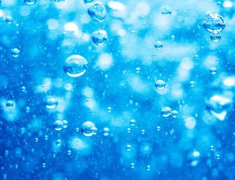 Blue water background with bubbles Stock Photos
