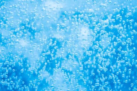 Blue water background with bubbles Stock Photos