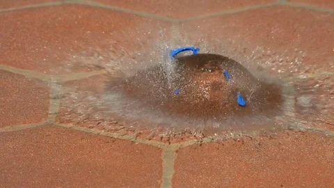 Blue Water Balloon Explodes On Tiled Floor 2000fps Slow Motion Stock Footage 82552989