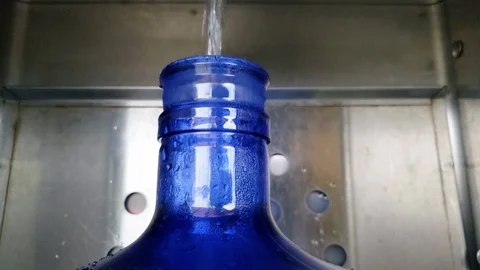 Blue water container refilling Stock Footage 108165855