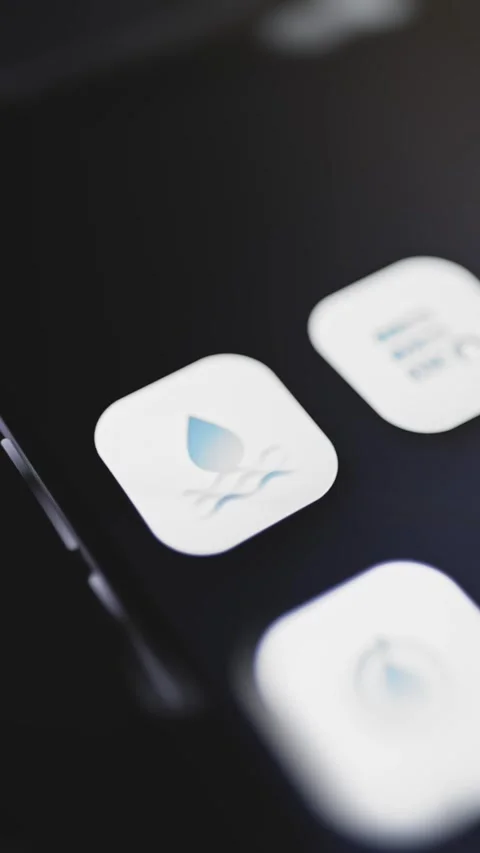 Blue water drop floating above waves Stock Footage 344858303