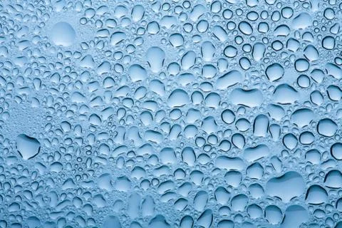 Blue water drops background Stock Photos