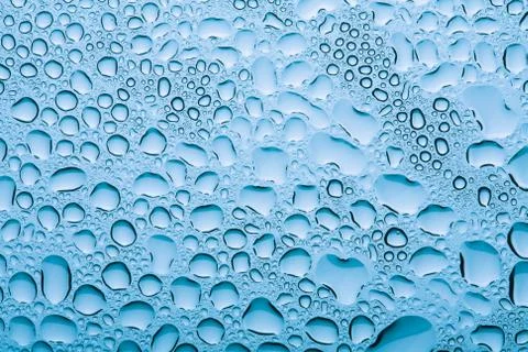 Blue water drops background Stock Photos