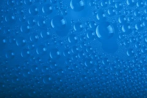 Blue water drops background Stock Photos