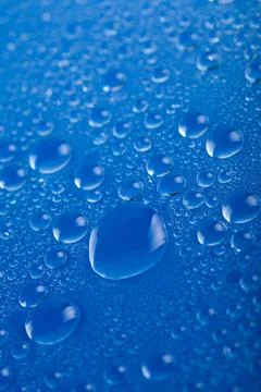 Blue water drops background Stock Photos