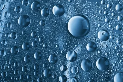 Blue water drops background Stock Photos