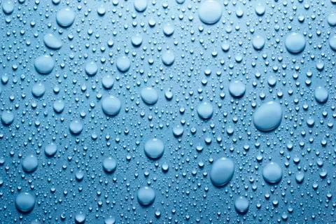 Blue water drops background Stock Photos