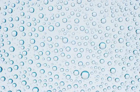 Blue water drops background Stock Photos