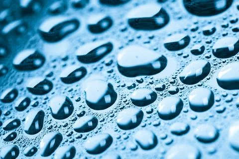 Blue water drops background Stock Photos