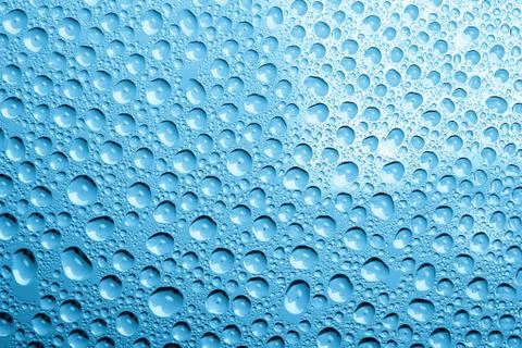 Blue water drops background Stock Photos