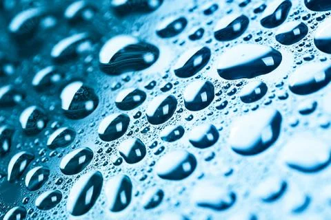 Blue water drops background Stock Photos