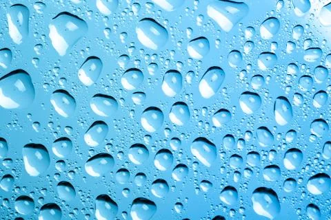 Blue water drops background Stock Photos