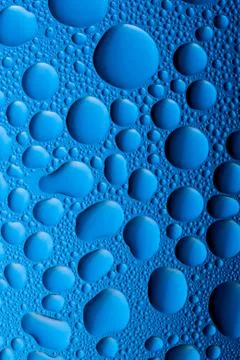 Blue water drops Stock Photos
