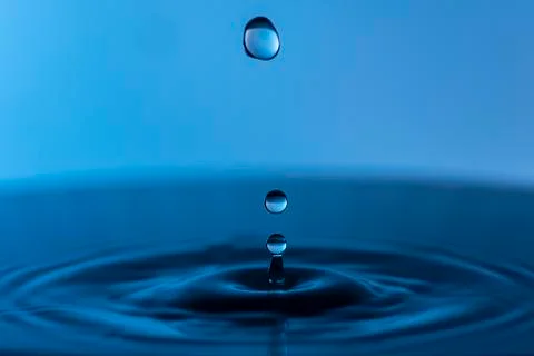 Blue water drops Stock Photos