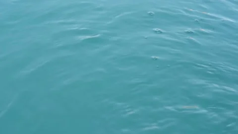 Blue water flow with bubbles. Pool filtration concept, natural sources, water fl Stock Footage 168669210