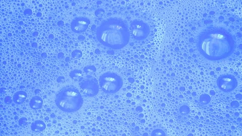 Blue water with foam bubbles background, foam bubble dishwashing liquid Stock Footage 134250258