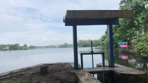 The blue water gate functions to control the water level. Video stock 309843777