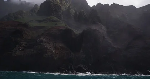 Blue water ocean surrounded by the mountain range Stock Footage 109416176