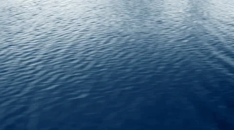 Blue water passing view from a moving boat Stock Footage 41257244
