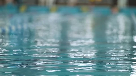 Blue water in the pool, Blue water waves surface close-up. Blue waves in the Stock Footage 255680075