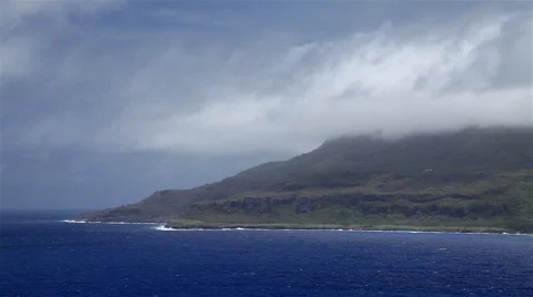 Blue Water remote Island cloud formation Stock Footage 50303707