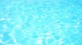 Blue Water Ripples Fastly in Swimming Pool under Bright Sun. Speed up. HD Footage