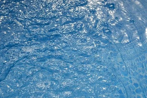 Blue water surface with bubbles Stock Photos