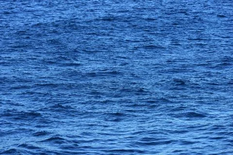 Blue water surface. Stock Photos
